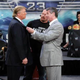 This is what a Battle of the Billionaires looks like, WWE style (Photo: Bryan Bedder/Getty Images)